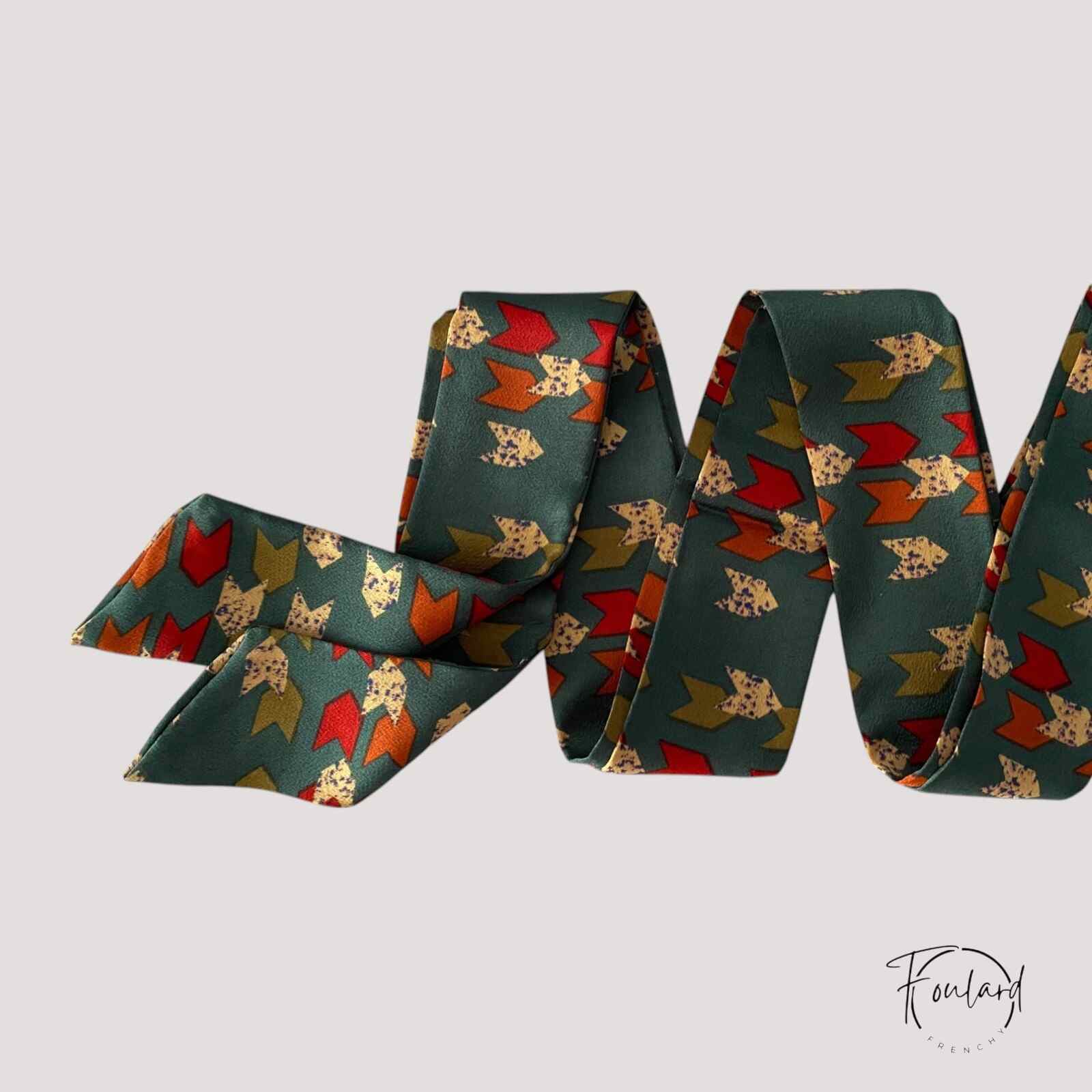 Ceinture foulard verte avec motifs flèches multicolores