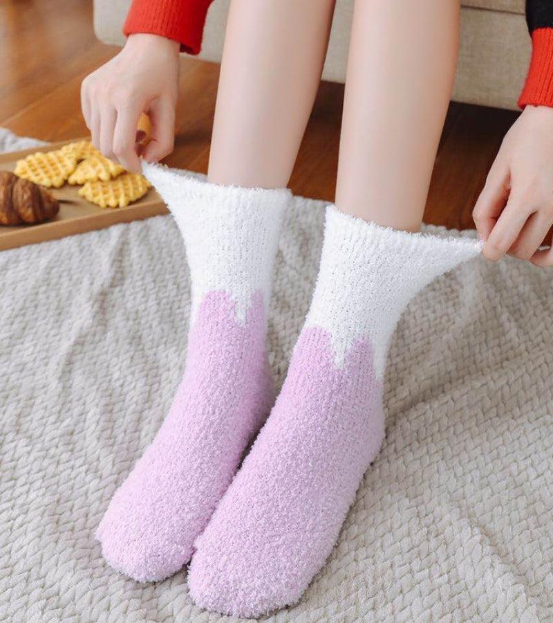 Chaussettes pliées montrant la matière épaisse et moelleuse