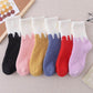 Chaussettes bicolores noires et blanches en Pilou Pilou