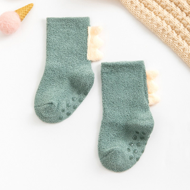 Chaussettes bébé molletonnées avec motif brodé à l'arrière