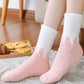 Chaussettes montantes rose et blanche pour l'hiver