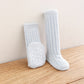 Chaussettes polaires, couleur jaune, sur fond blanc