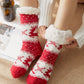 Chaussettes rouges de Noël avec motifs festifs et semelle antidérapante