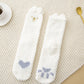Chaussettes blanches en polaire avec motifs de chats