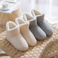 Chaussons gris en mouton synthétique avec intérieur blanc moelleux
