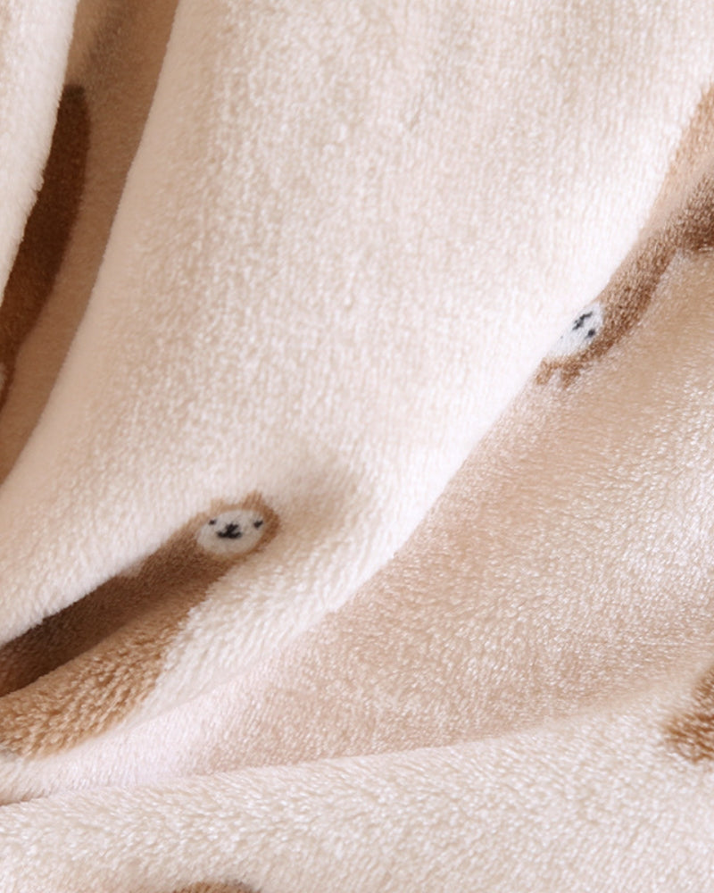 Détail de la fermeture à boutons sur le devant