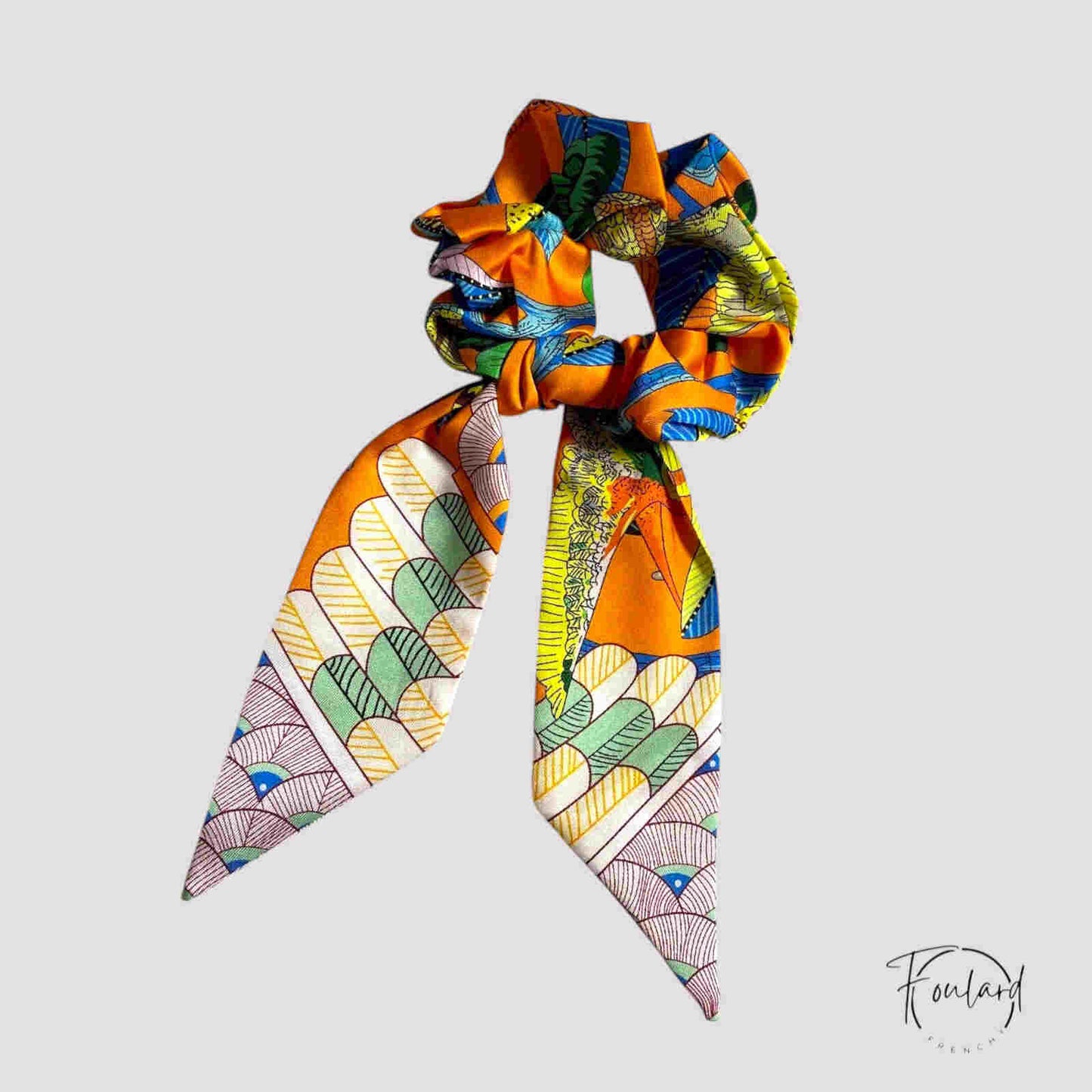 Accessoire cheveux orange à motifs tropicaux, vue de côté