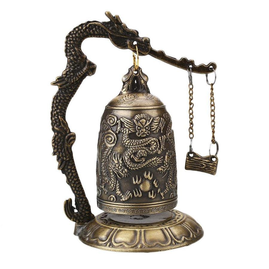 Cloche bouddhiste en laiton avec motifs de dragon sculptés