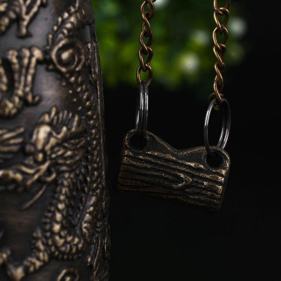 Détail du support en laiton avec sculpture de dragon