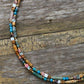 Collier double rang avec pierres colorées et fermoir mousqueton