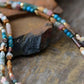 Détail des pierres de turquoise, aventurine et jaspe