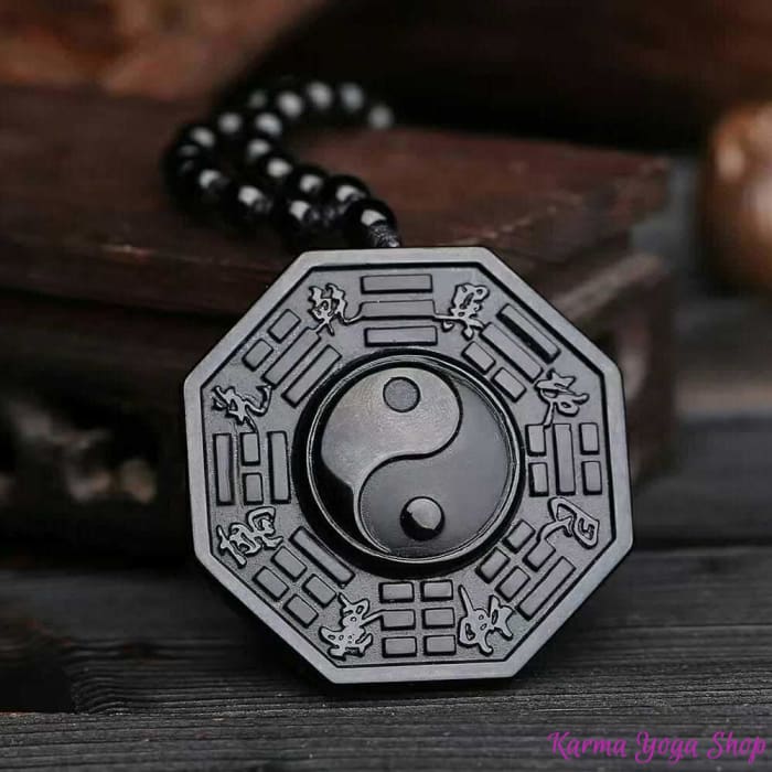 Collier obsidienne noire avec pendentif Yin Yang sculpté