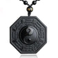 Collier obsidienne noire montrant les trigrammes et symboles taoïstes