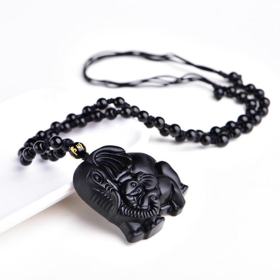 Collier en obsidienne avec pendentif éléphants sculptés