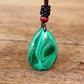 Vue d'ensemble du collier malachite sur cordon tressé marron