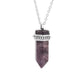 Vue rapprochée du pendentif hexagonal montrant sa texture