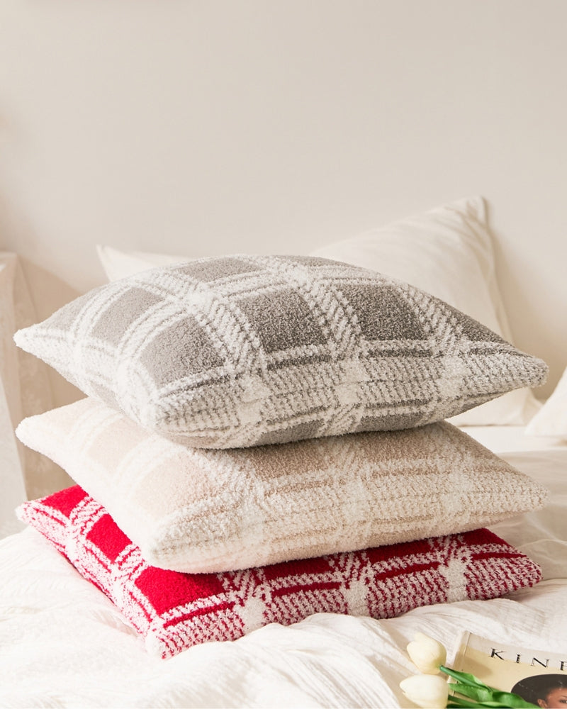 Vue latérale du coussin en microfibre grise