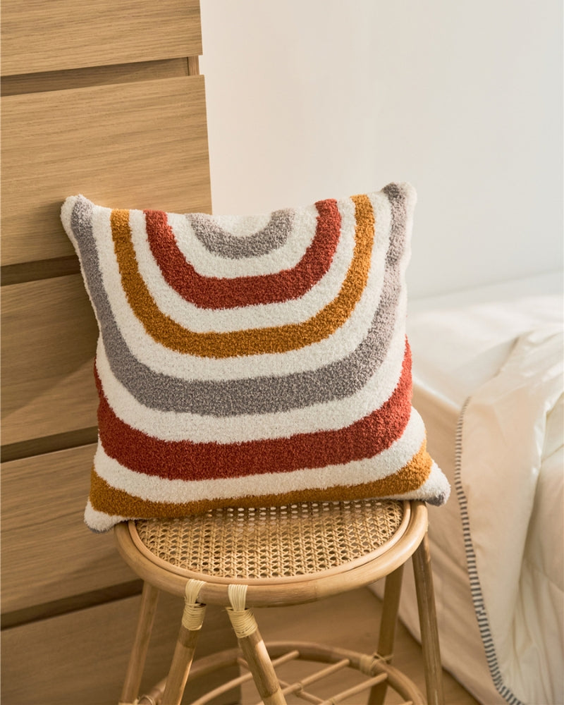 Coussin décoratif avec bandes de couleurs vibrantes