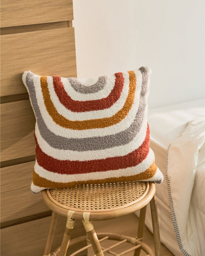 Coussin décoratif avec bandes de couleurs vibrantes