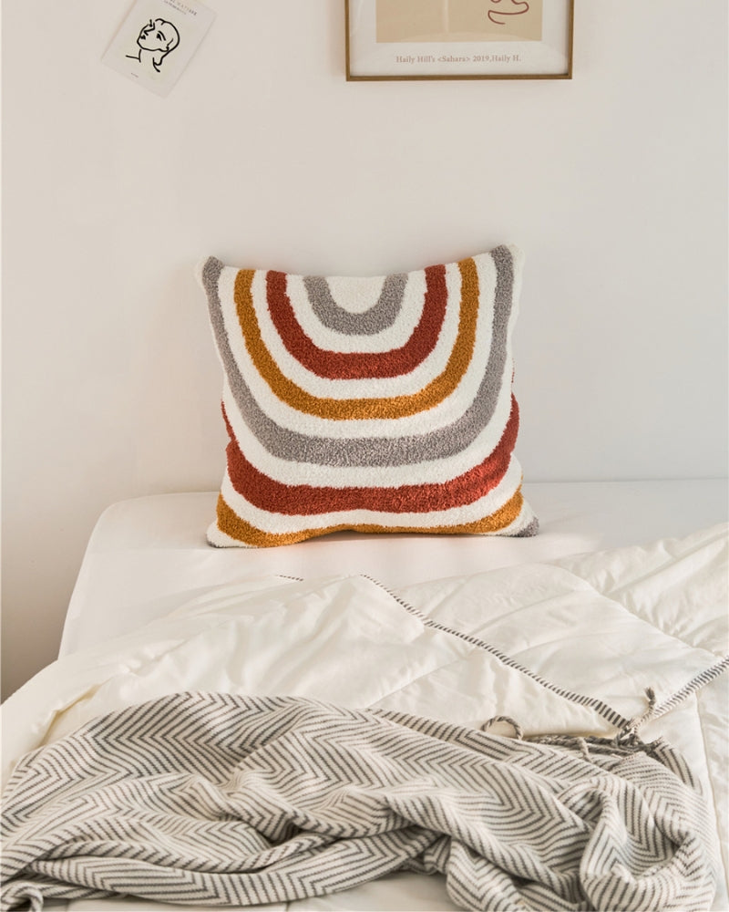 Coussin aux motifs hippie avec teintes vives et variées