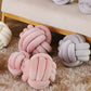 Coussin noué en velours avec détails de tressage
