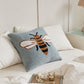 Détail du motif abeille sur le coussin en microfibre