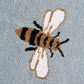 Zoom sur les motifs d'abeilles élégants