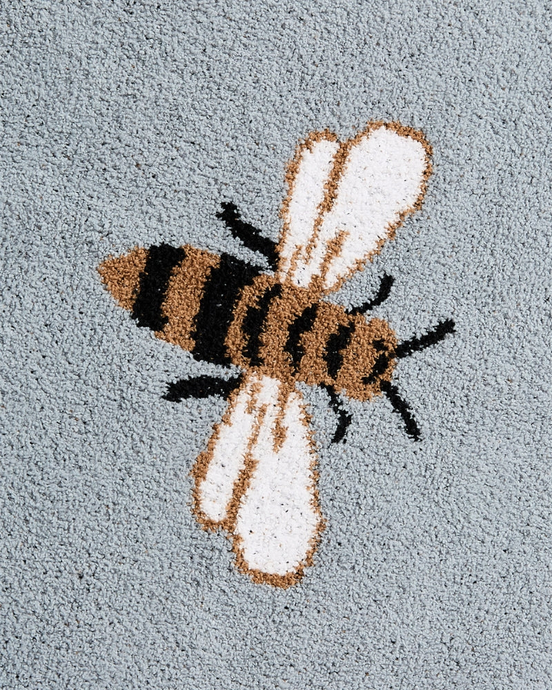 Zoom sur les motifs d'abeilles élégants
