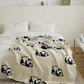 Vue d'ensemble couverture flanelle avec pandas stylisés
