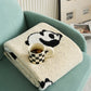 Détail des motifs pandas sur couverture flanelle beige