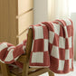 Détail des coutures de la couverture marron et blanche