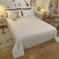 Gros plan sur la texture douce d'un drap housse blanc