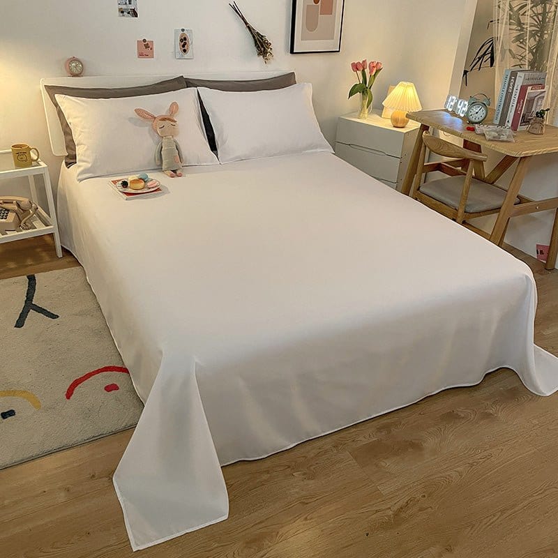 Gros plan sur la texture douce d'un drap housse blanc