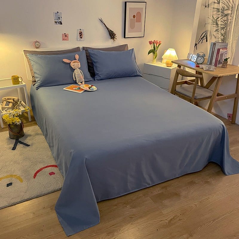 Gros plan sur la texture douce d'un drap housse bleu
