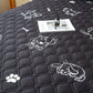Vue latérale du drap housse installé sur un matelas