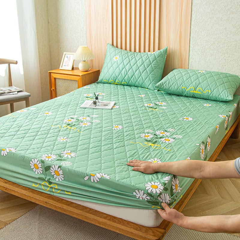 Vue d'ensemble d'une chambre avec drap housse installé
