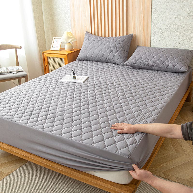 Drap housse imperméable installé sur un matelas, vue de dessus