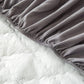 Vue latérale du drap housse imperméable couvrant un matelas