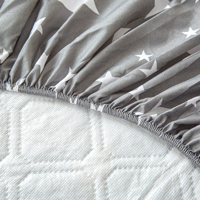 Détail des coutures renforcées du drap housse