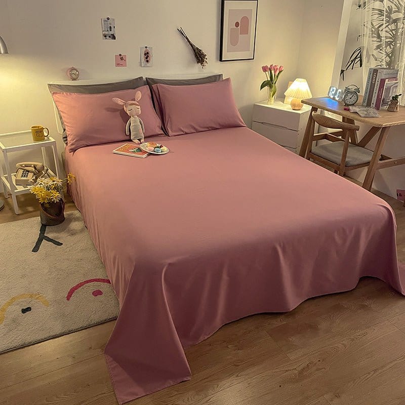 Gros plan sur la texture douce d'un drap housse rose