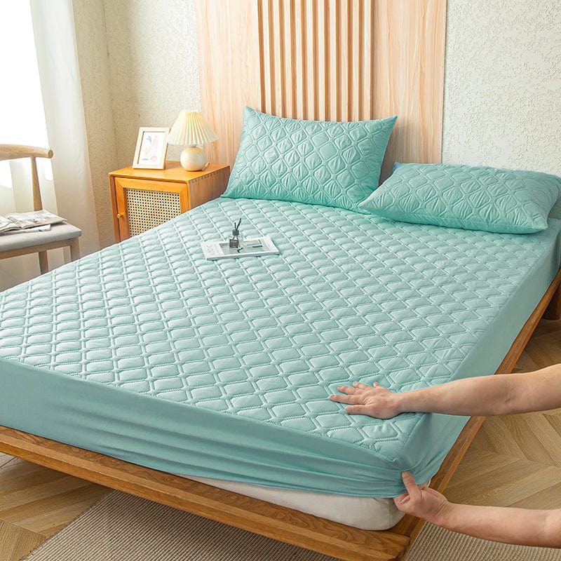 Vue de dessus du drap housse turquoise installé