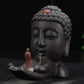 Tête de Bouddha en céramique avec cônes d'encens