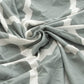 Housse de coussin avec motifs géométriques colorés