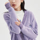 Vue de face du gilet violet avec boutons et poches