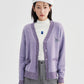 Gros plan sur le motif amusant du gilet violet