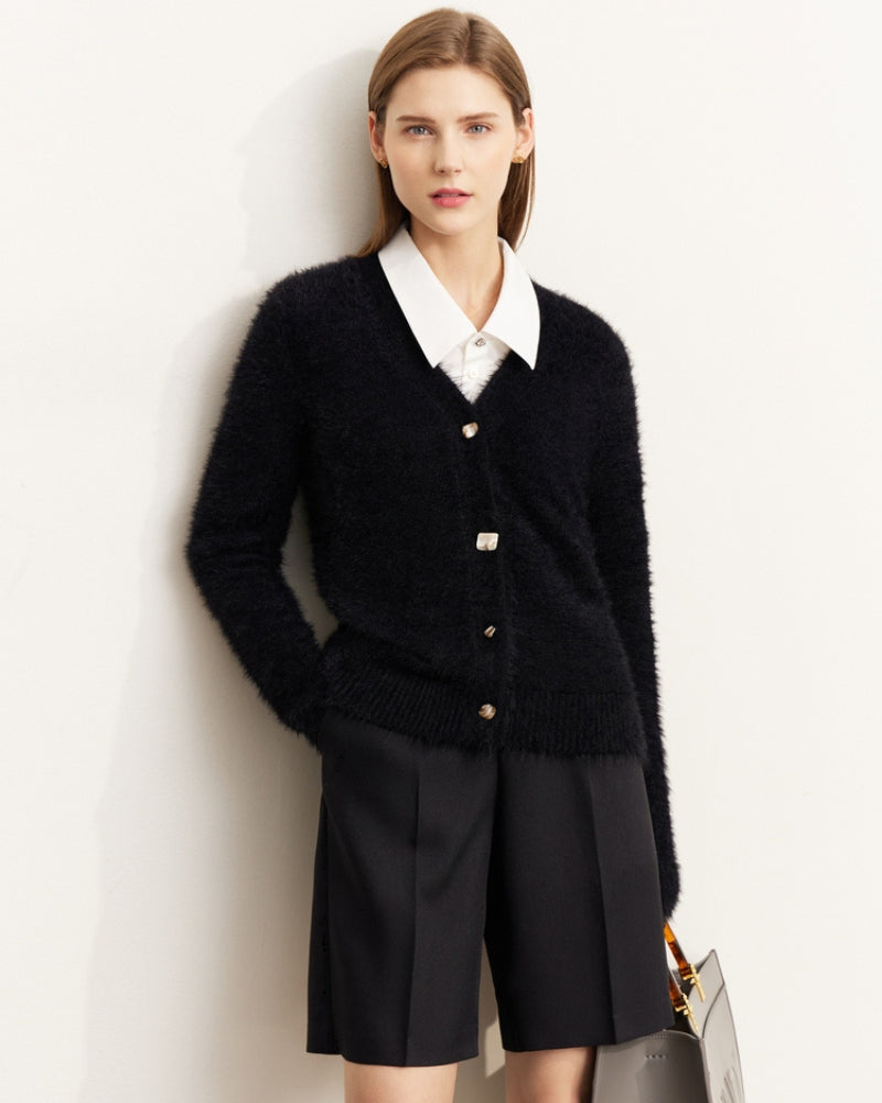 Gilet noir doux assorti à un short noir