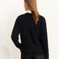 Gilet noir doux avec col V et boutons renforcés