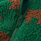 Gilet vert ouvert, montrant l'intérieur doux et confortable