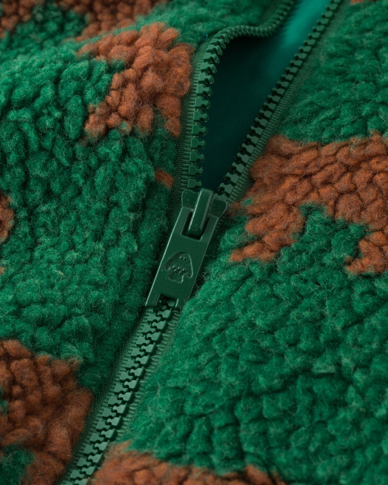 Gilet vert ouvert, montrant l'intérieur doux et confortable