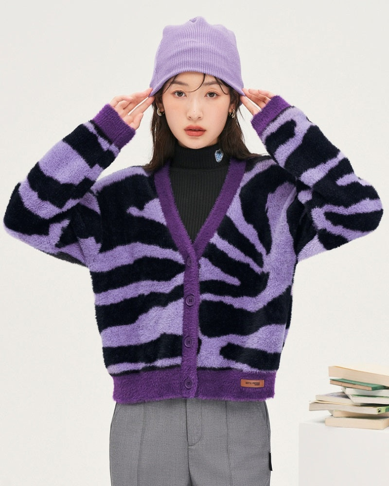 Détail des boutons du gilet en matière sherpa